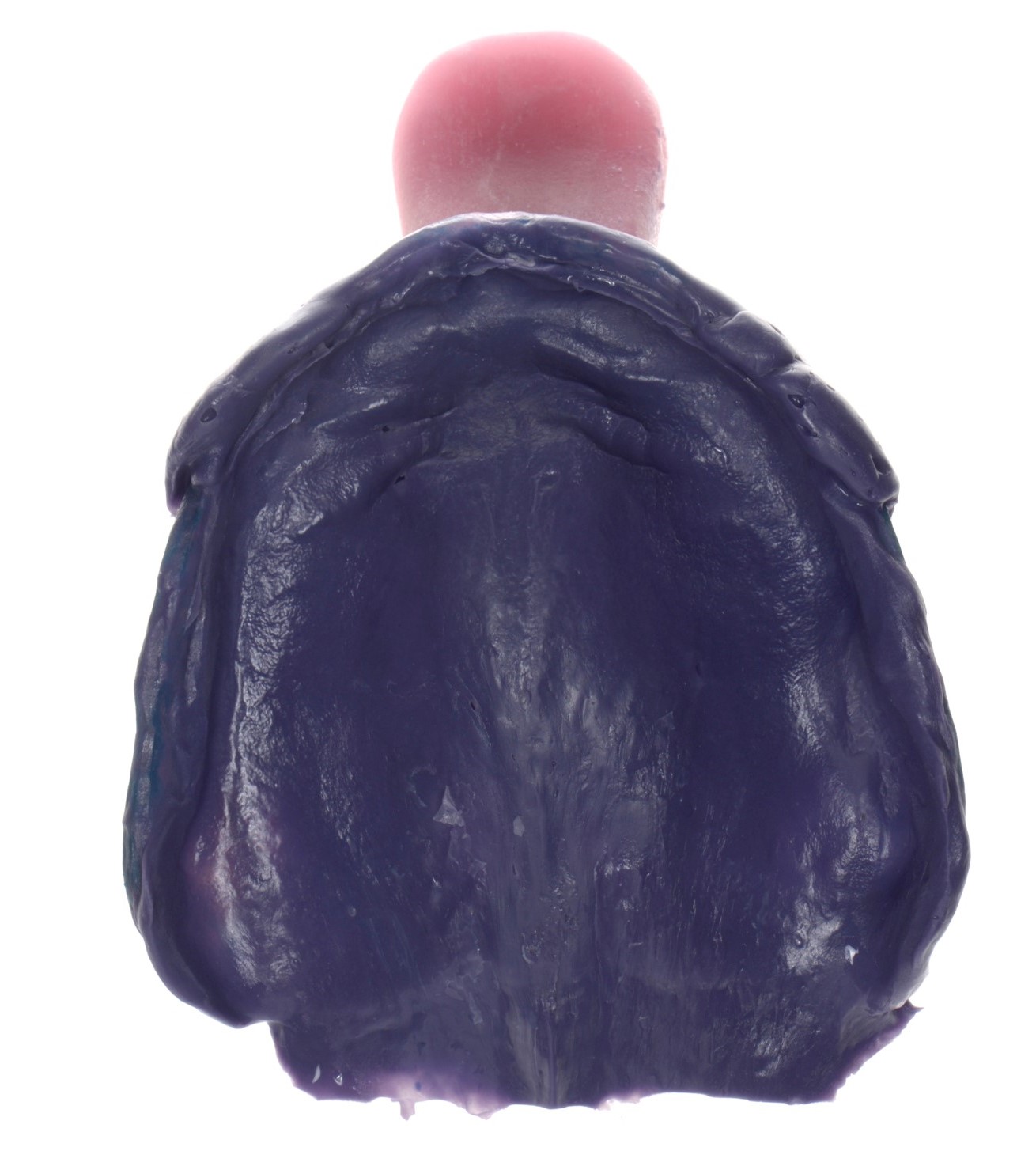 Purple dental impression material shaped for an upper jaw, with pink handle at the top, against a white background.