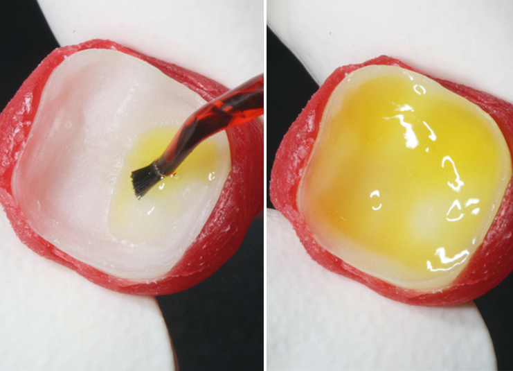Close-up of two fruit halves with white centers and red peels. The left half shows a brush applying yellow liquid; the right is filled with yellow substance.